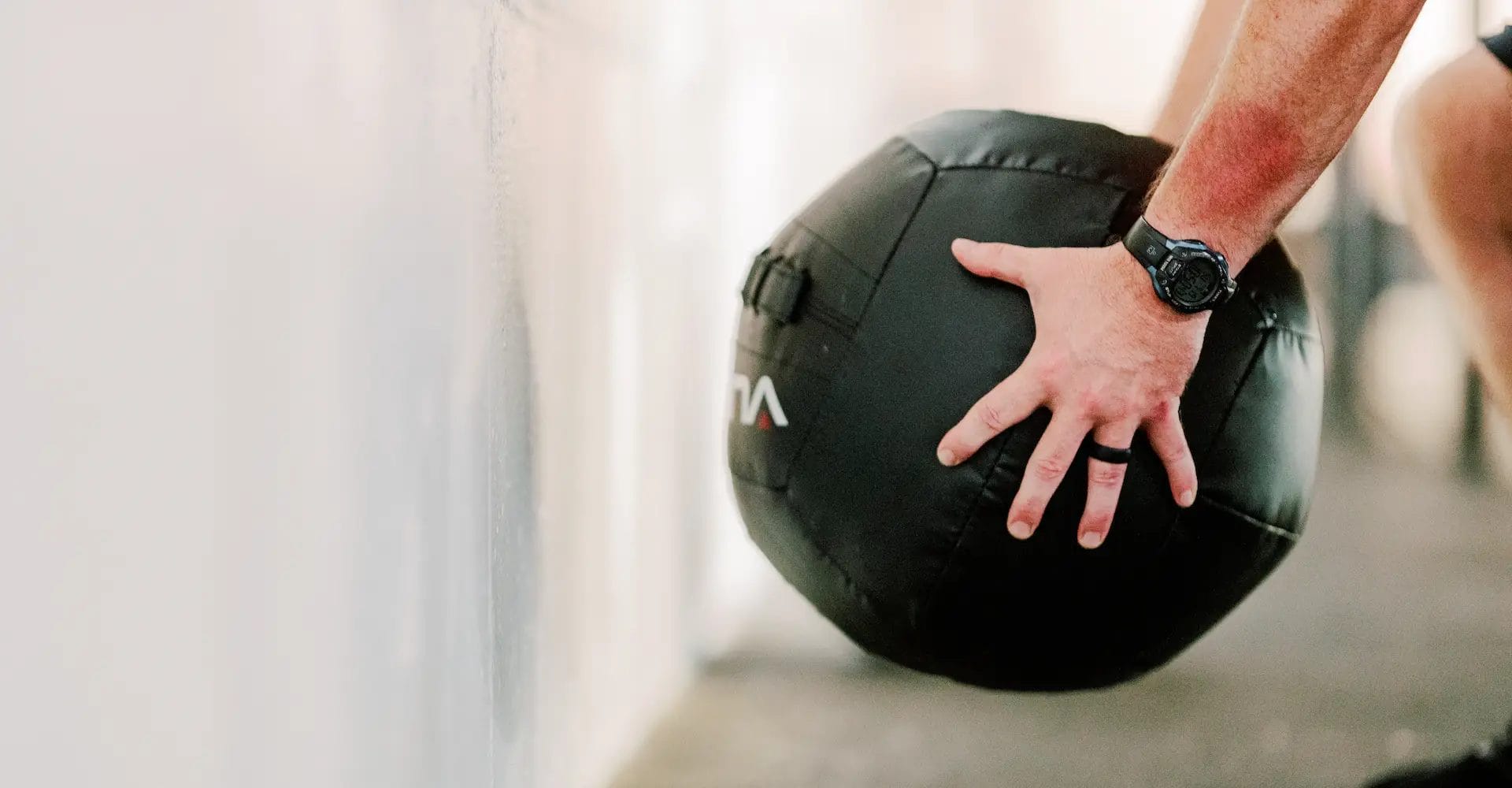 Man working out with medicine ball